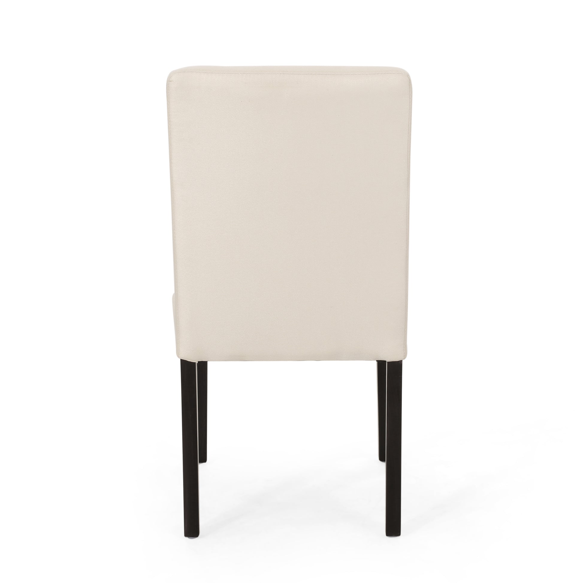 Back view of a cream upholstered dining chair with dark wooden legs