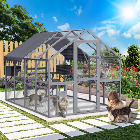 Large outdoor cat enclosure with multiple levels and gray canvas roof