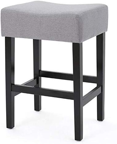 Gray upholstered counter stool with black wooden legs
