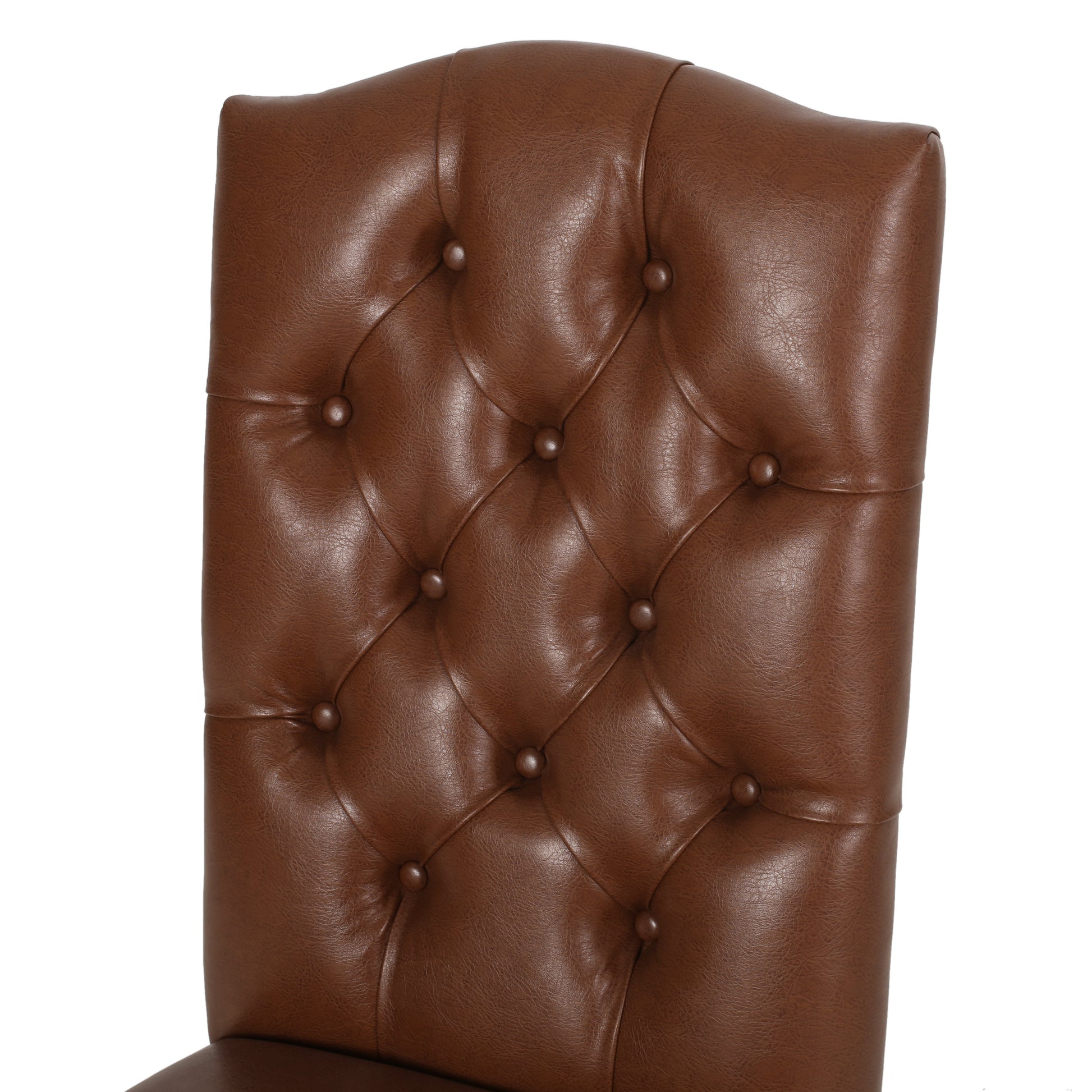 Brown leather tufted dining chair back with decorative buttons and elegant stitching