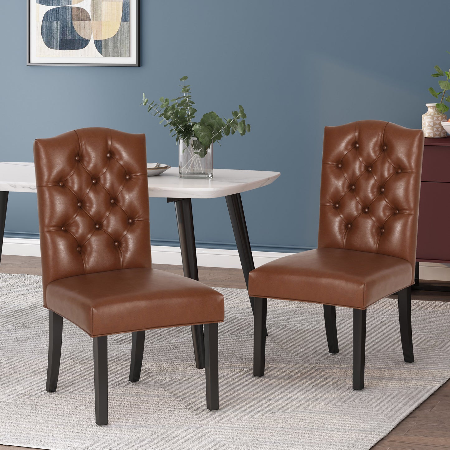 Brown leather tufted dining chair with dark wood legs