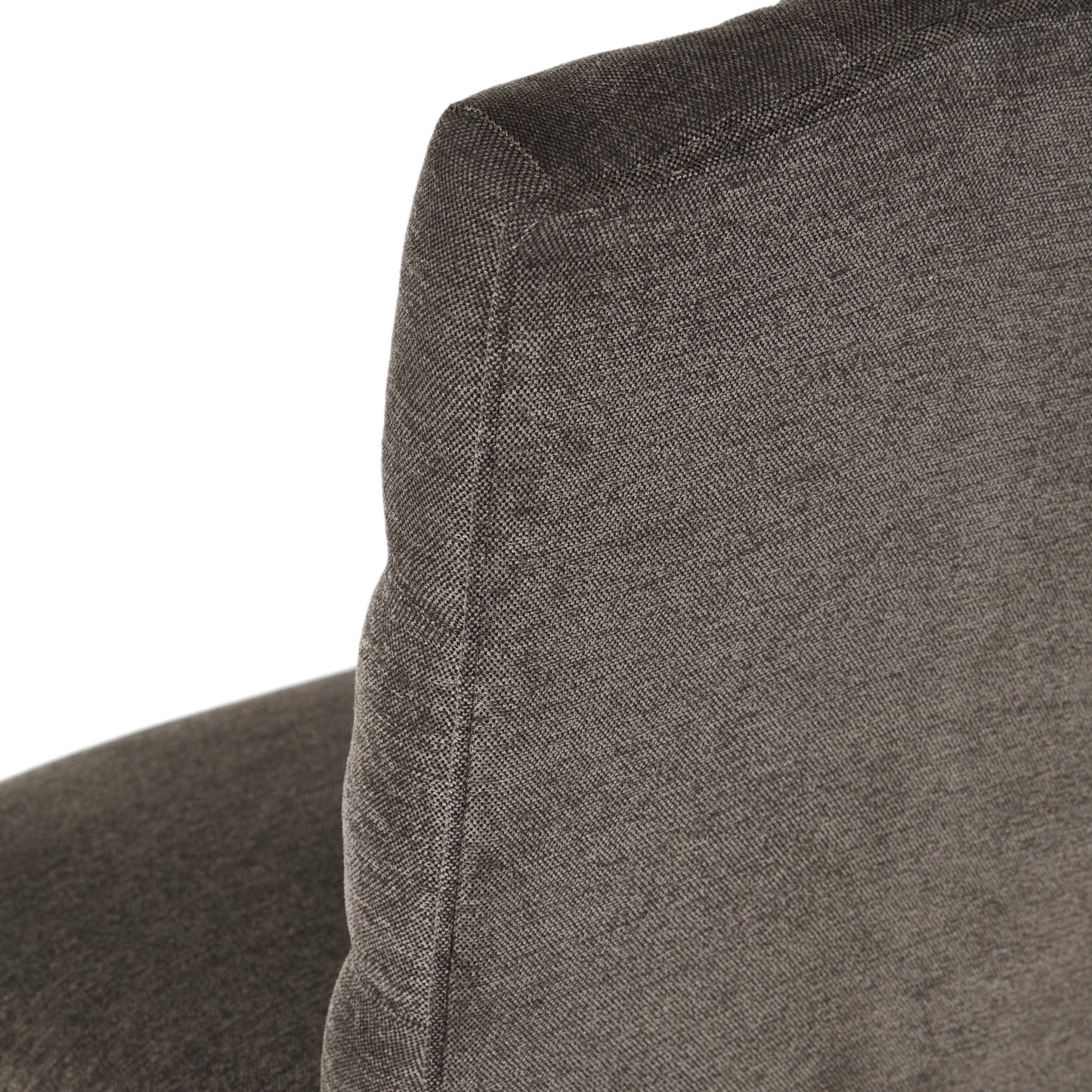 Closeup of charcoal grey woven fabric texture on a modern sofa cushion