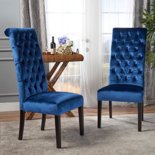 Deep blue velvet dining chair with tufted backrest and dark wooden legs