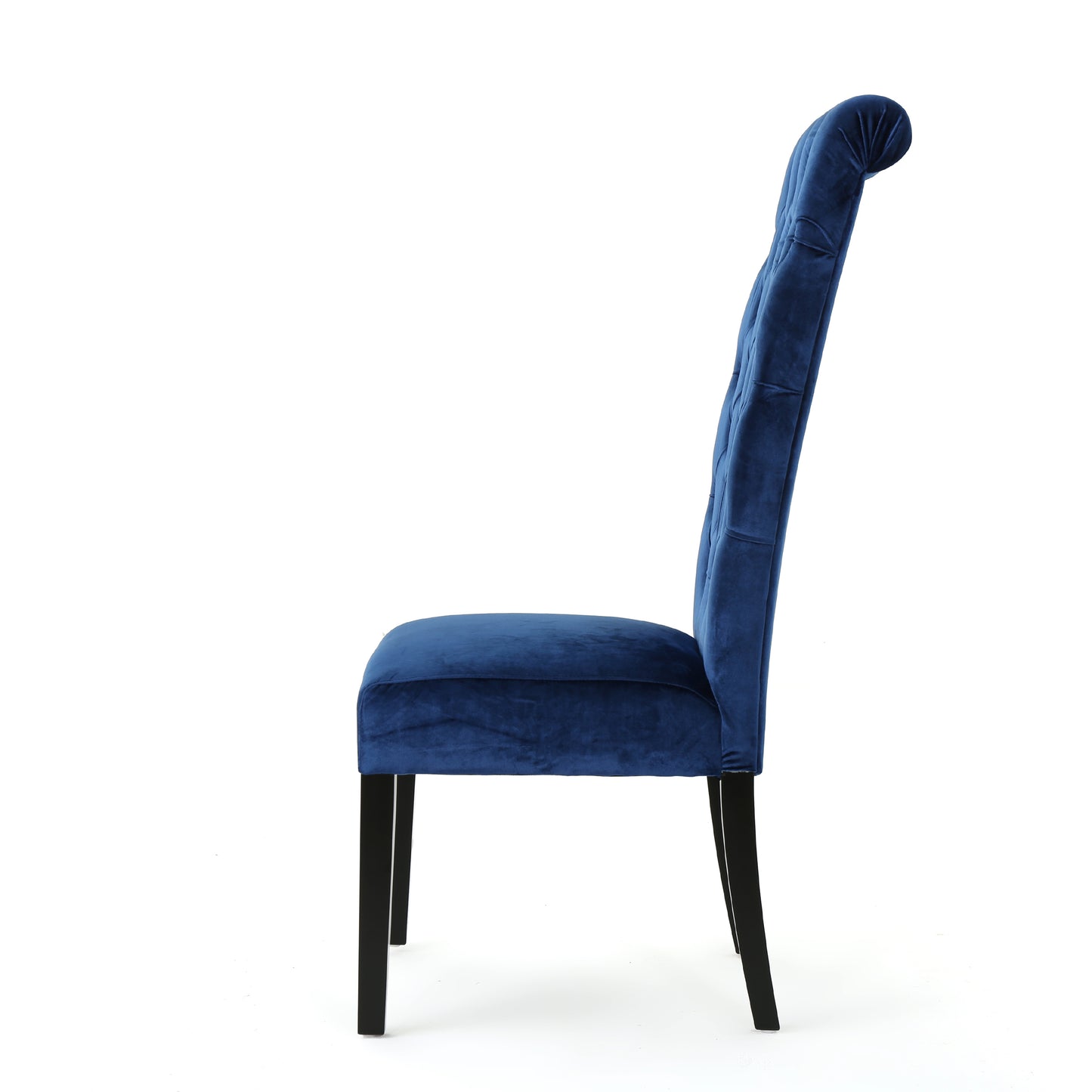Deep blue velvet dining chair with tufted back perfect for elegant interiors