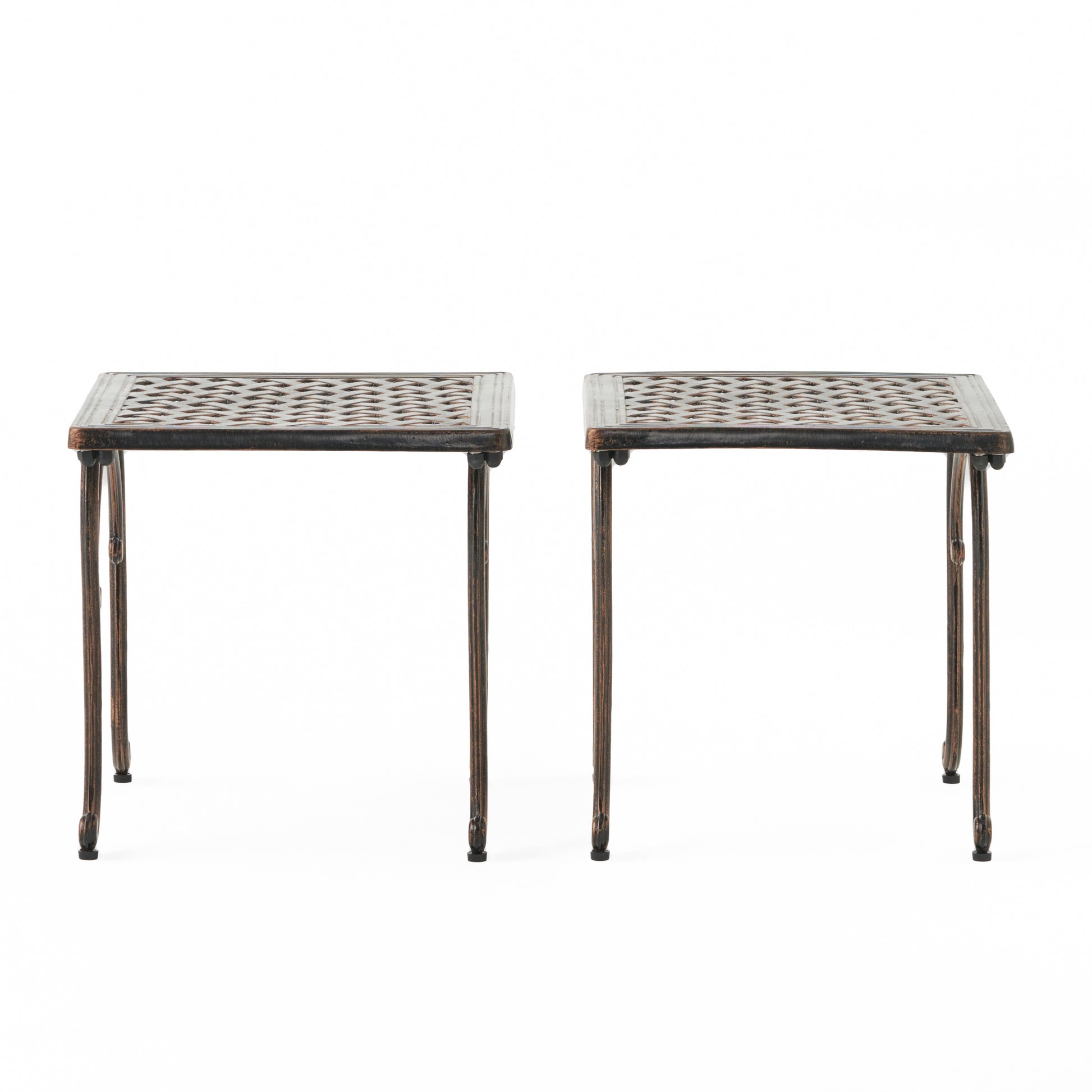 Two antique bronze metal side tables with intricate lattice tops and curved legs