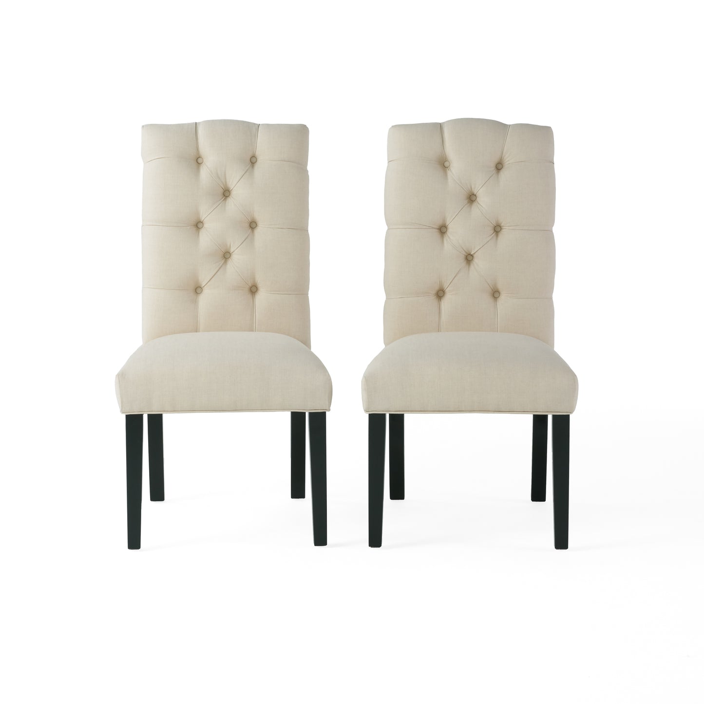 Pair of beige linen upholstered dining chairs with tufted backs and dark wood legs