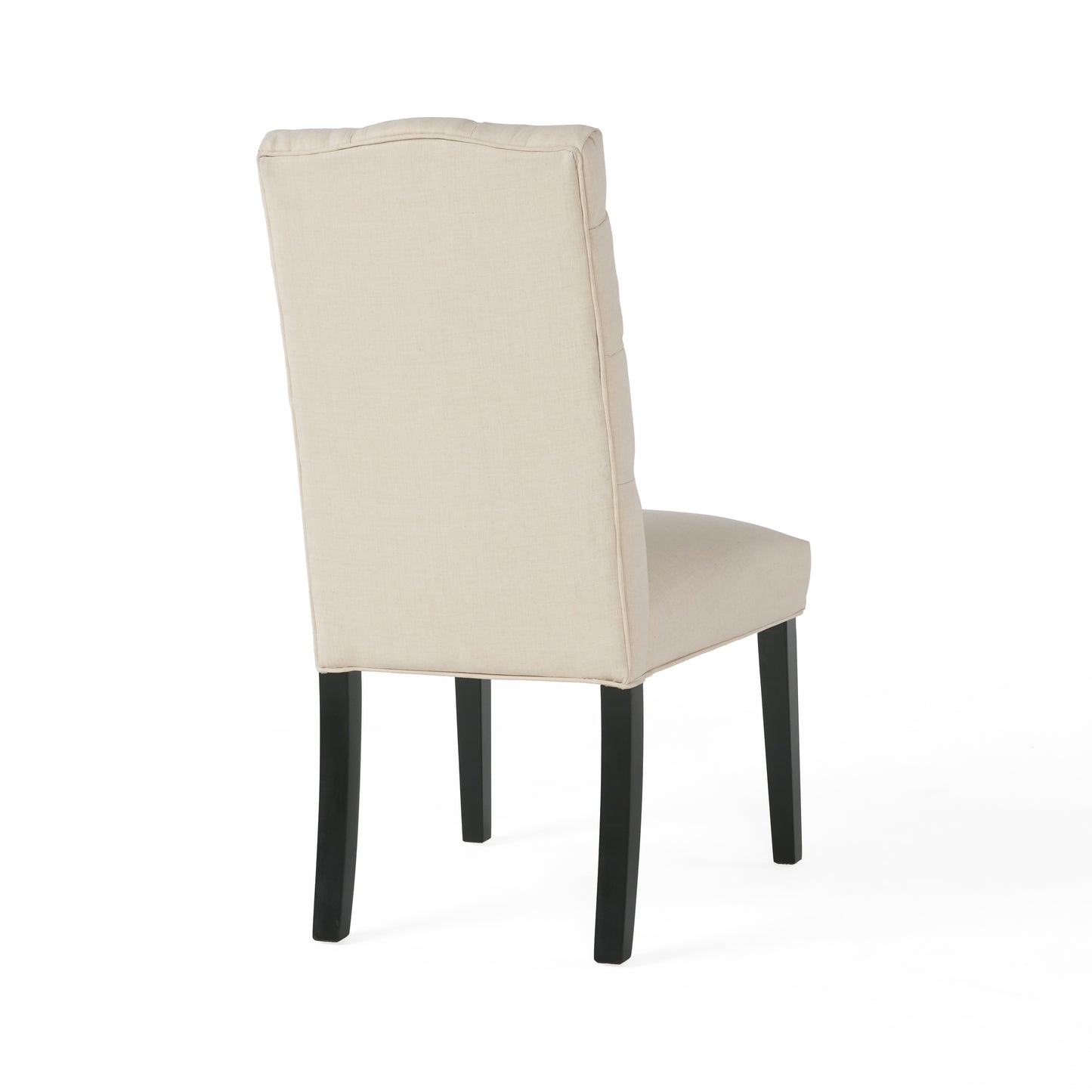 Beige upholstered dining chair with tufted back and dark wood legs