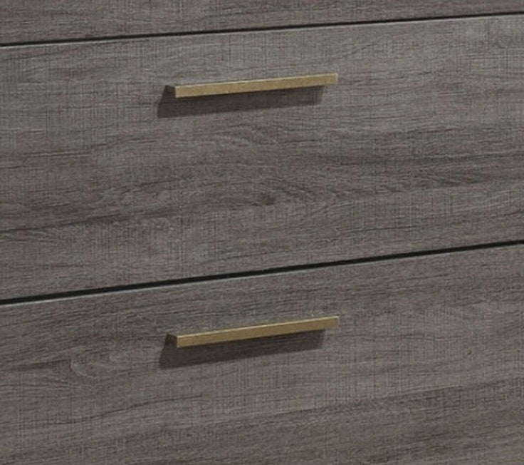 Dark gray wood dresser with gold bar pulls