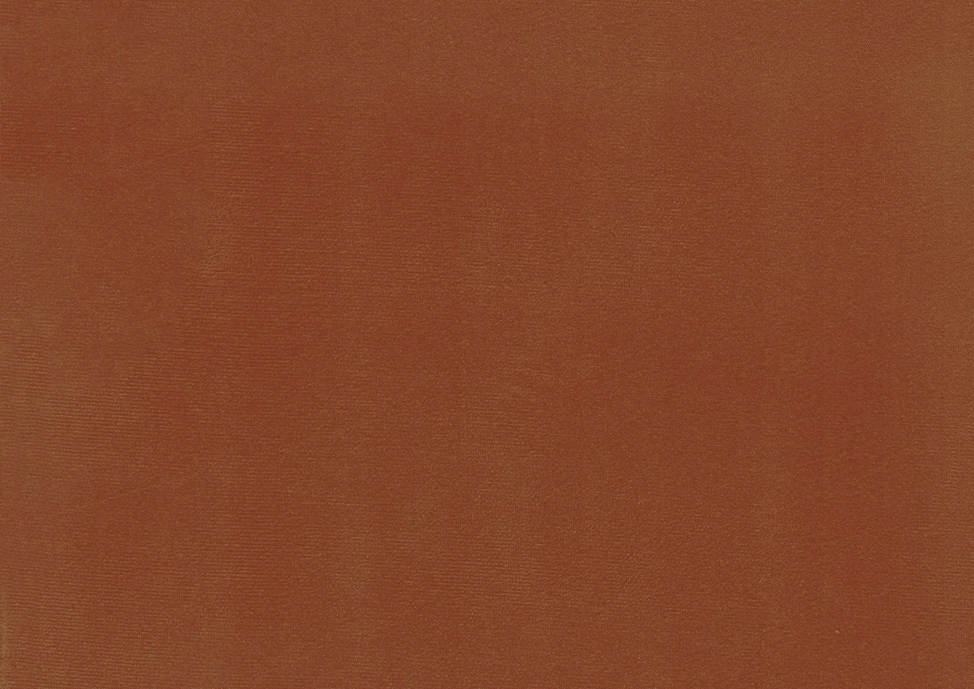 Textured terracotta velvet fabric swatch with a subtle sheen