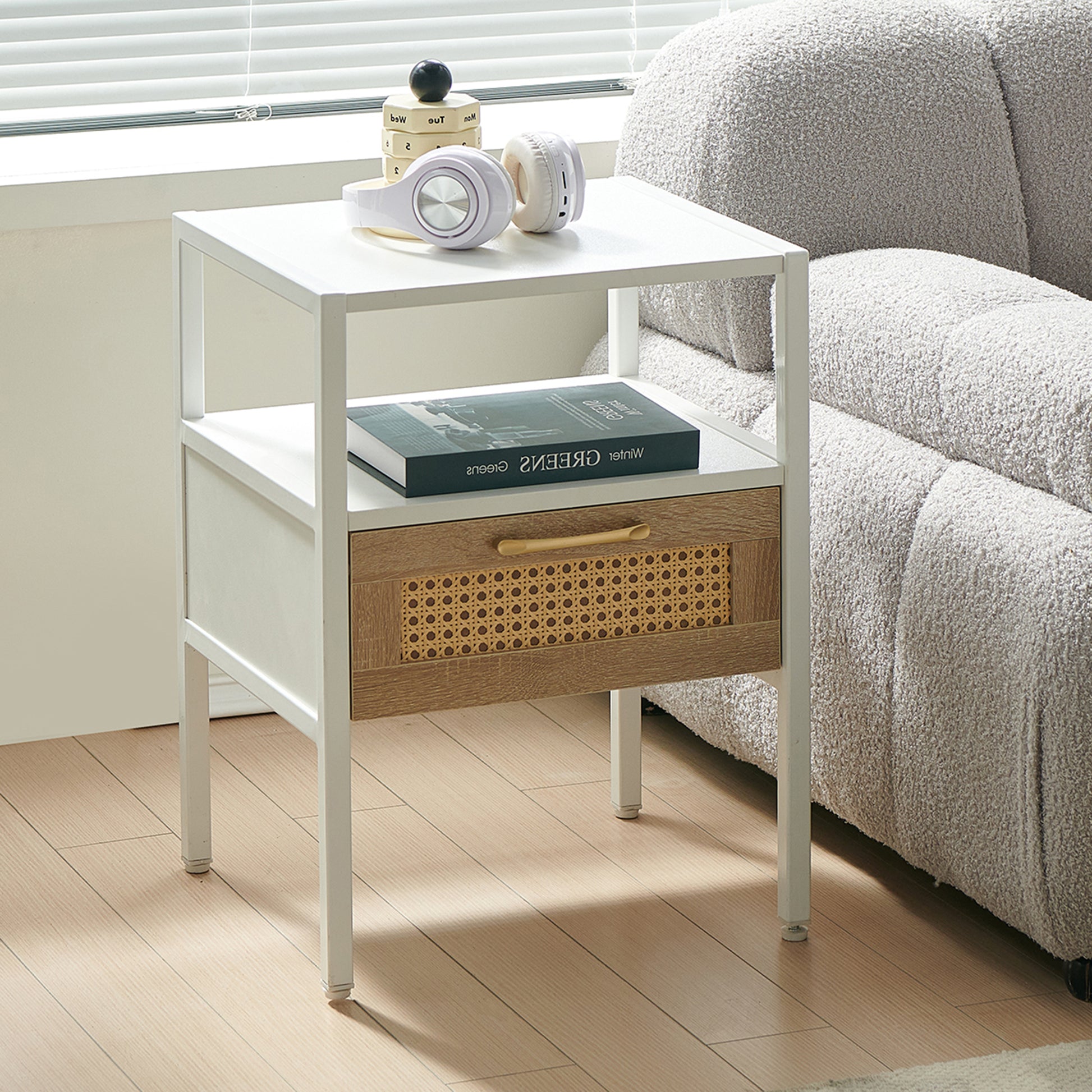 White metal frame side table with wood and rattan drawer front