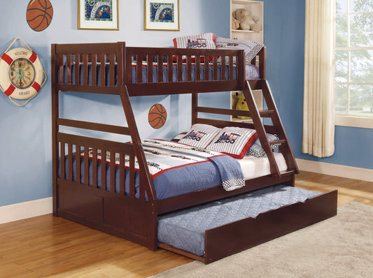 Dark brown wooden triple bunk bed with pullout trundle featuring trainthemed bedding