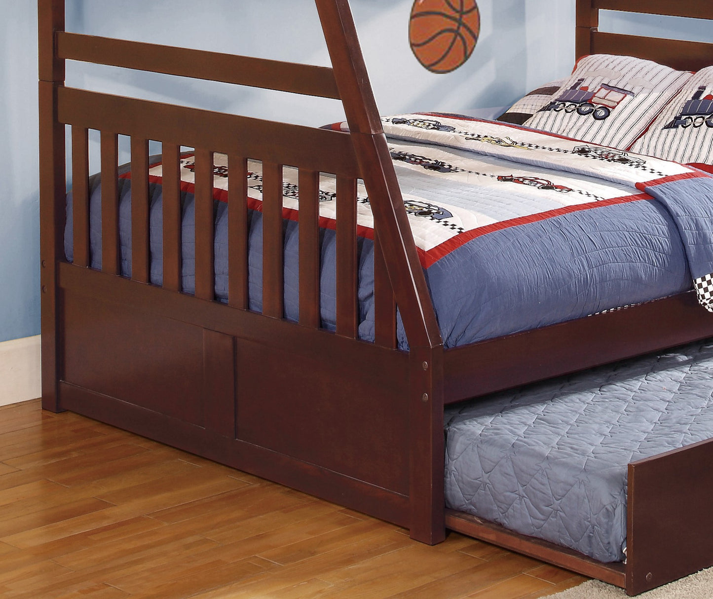 Dark wood twin size bunk bed with pullout trundle ready for kids