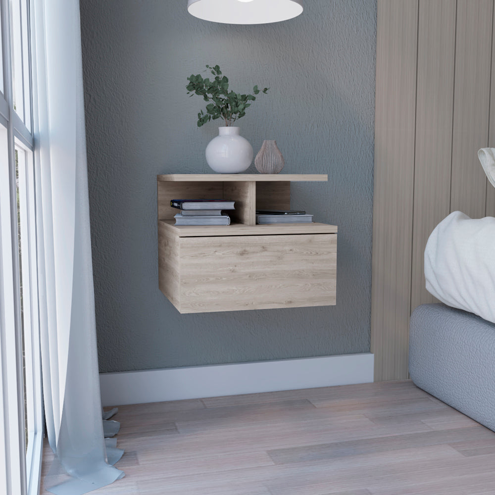 Floating bedside table with light wood grain finish and single drawer