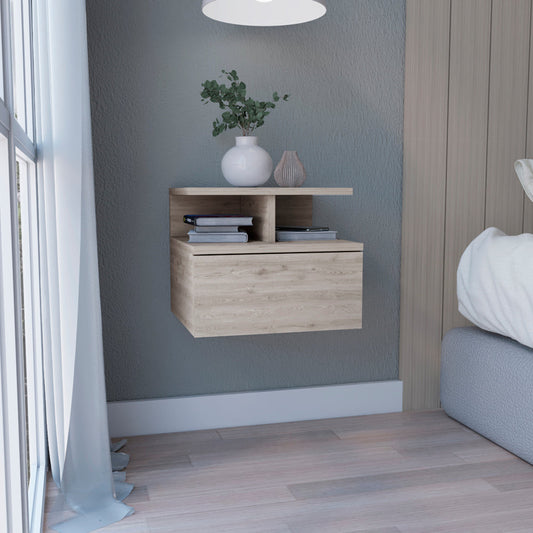 Floating bedside table with light wood grain finish and single drawer