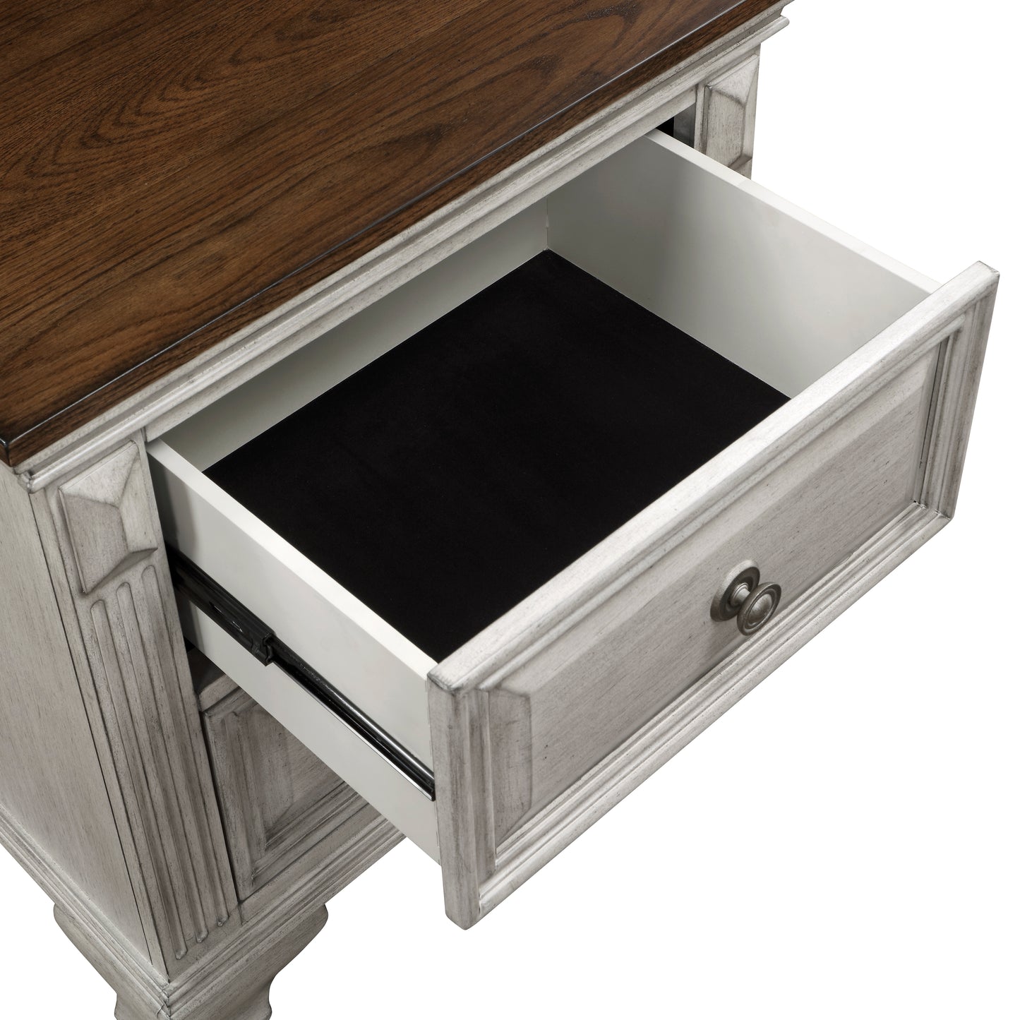 Distressed white wood nightstand with an open drawer revealing a black felt liner