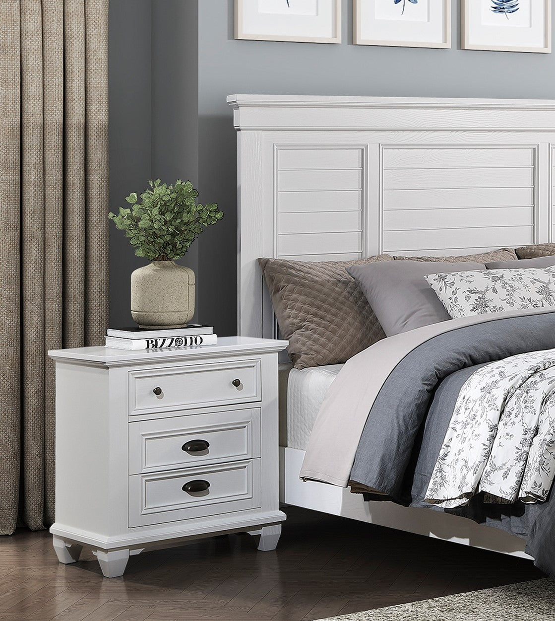White wooden nightstand with three drawers perfect for bedroom storage