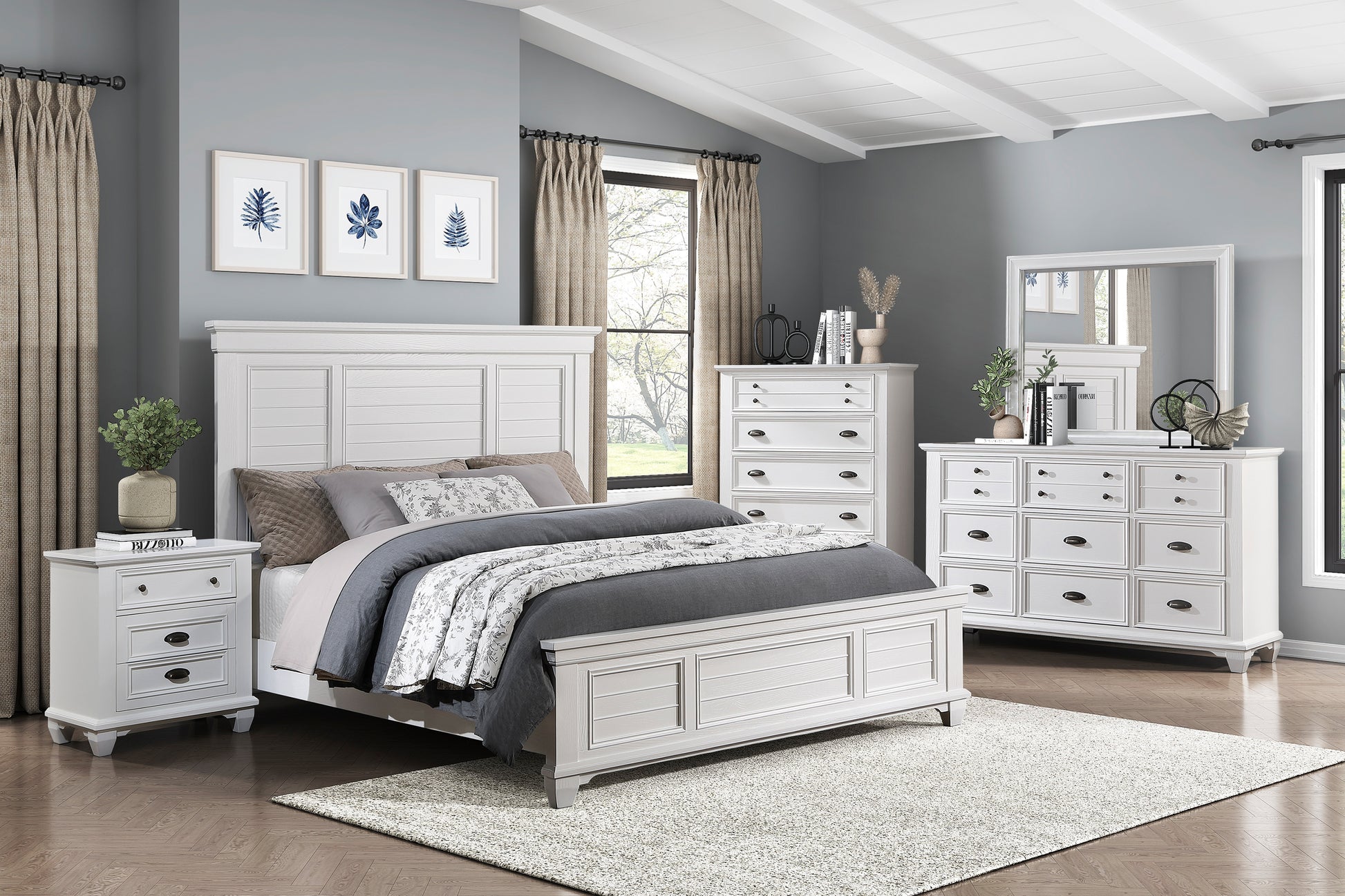 White planked headboard on a queen bed with gray bedding and a floral throw