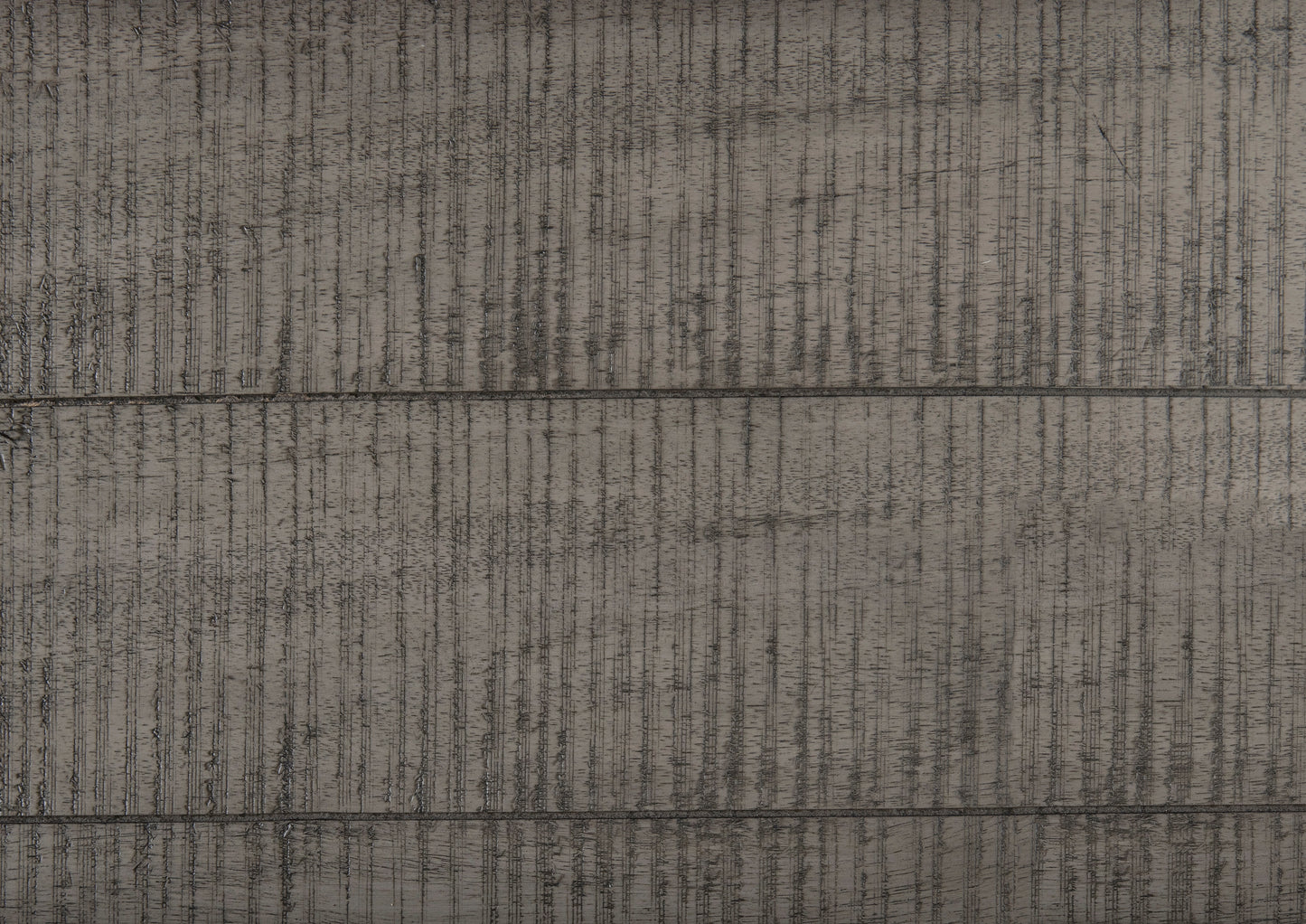 Textured grey wood plank surface with visible grain ideal for rustic furniture