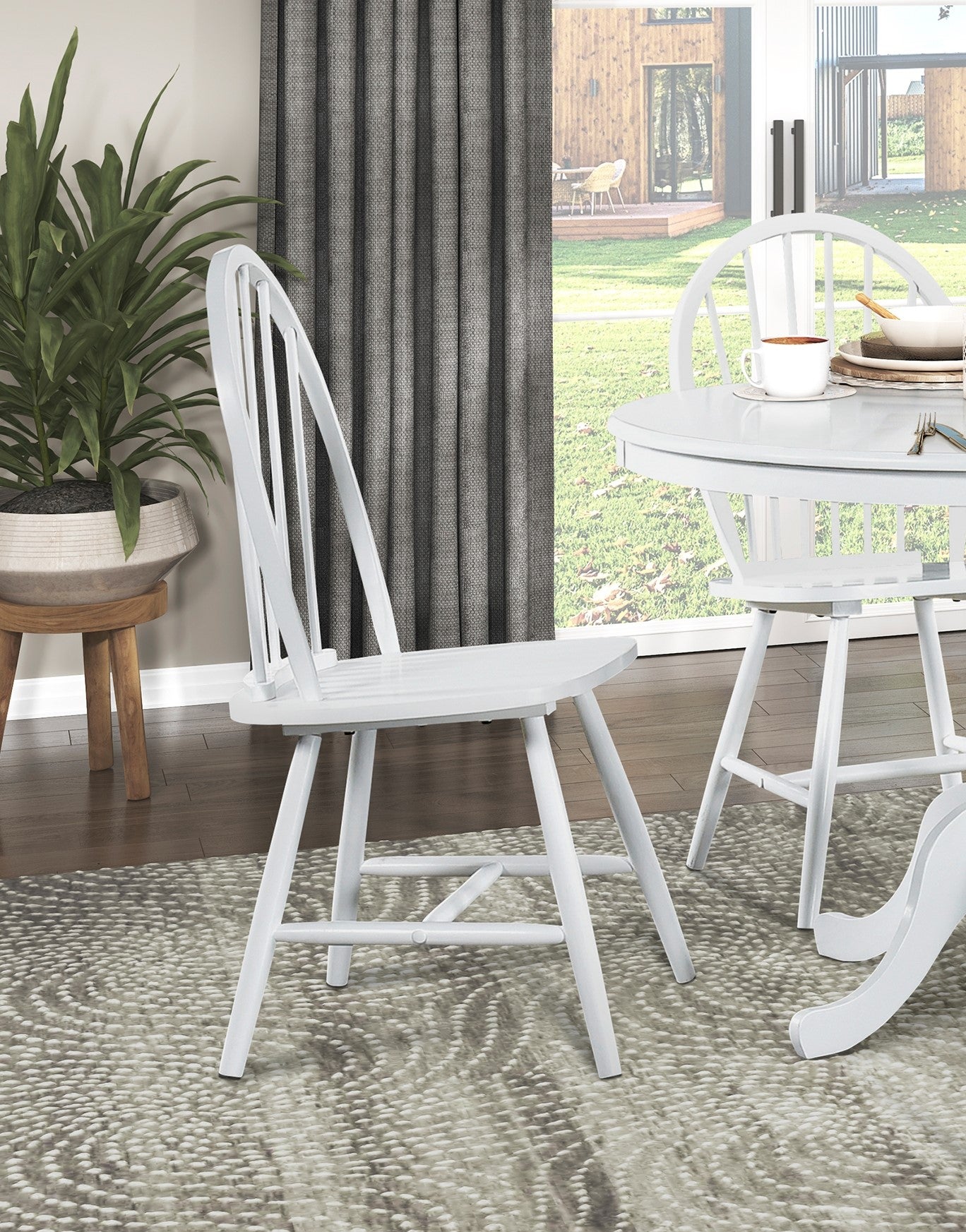 Classic white spindle back Windsor chair perfect for dining rooms and kitchens