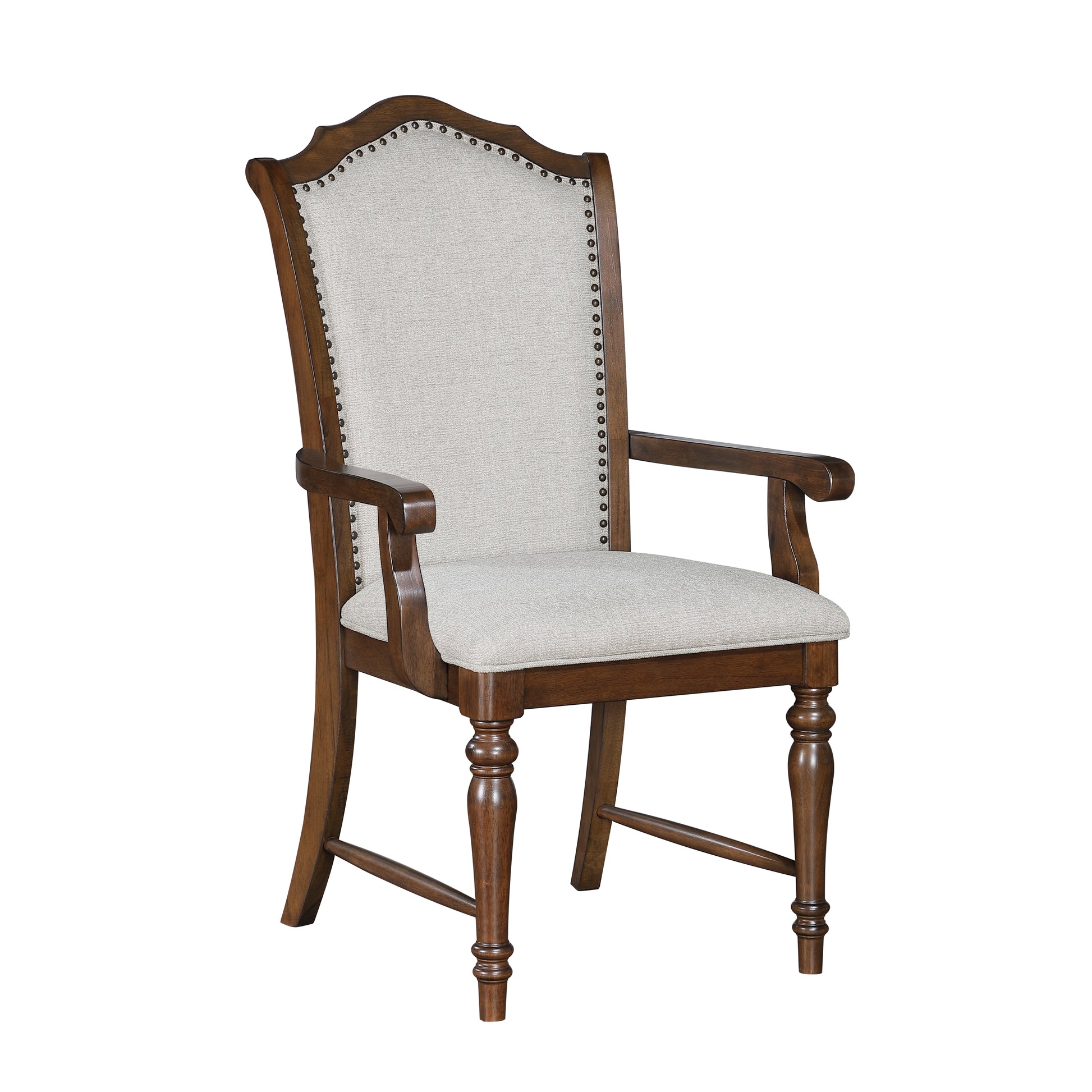 Upholstered dining arm chair with nailhead trim and turned legs