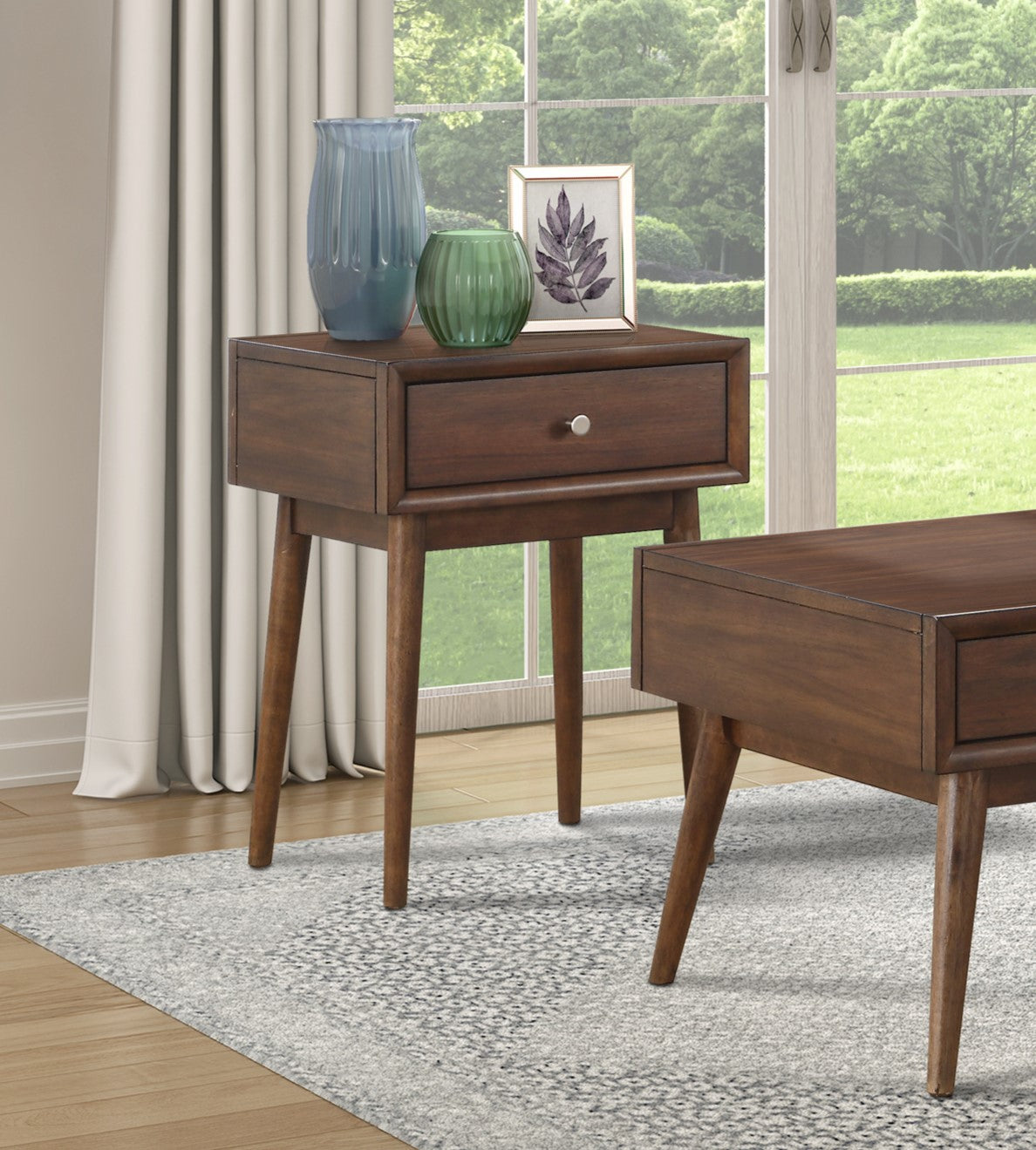 Midcentury modern dark wood end table with single drawer and tapered legs