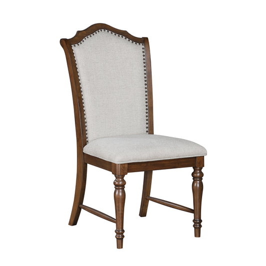 Elegant upholstered dining chair with nailhead trim and carved wood legs