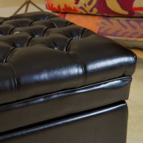 Black leather tufted storage ottoman with button accents
