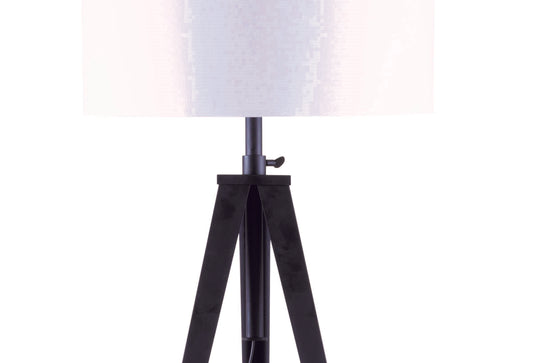 Black tripod floor lamp with white textured shade