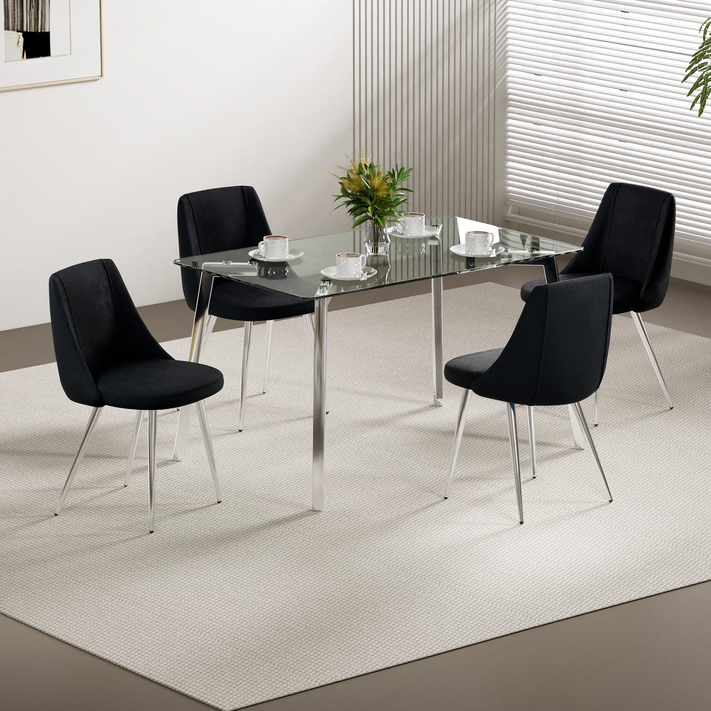 Set of four black upholstered dining chairs with chrome legs