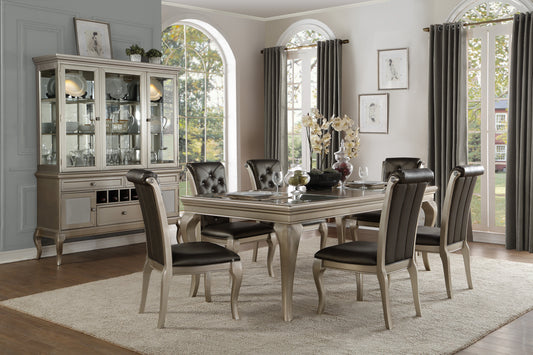 Elegant silver dining room set featuring a china cabinet with glass doors and a tufted chair dining set