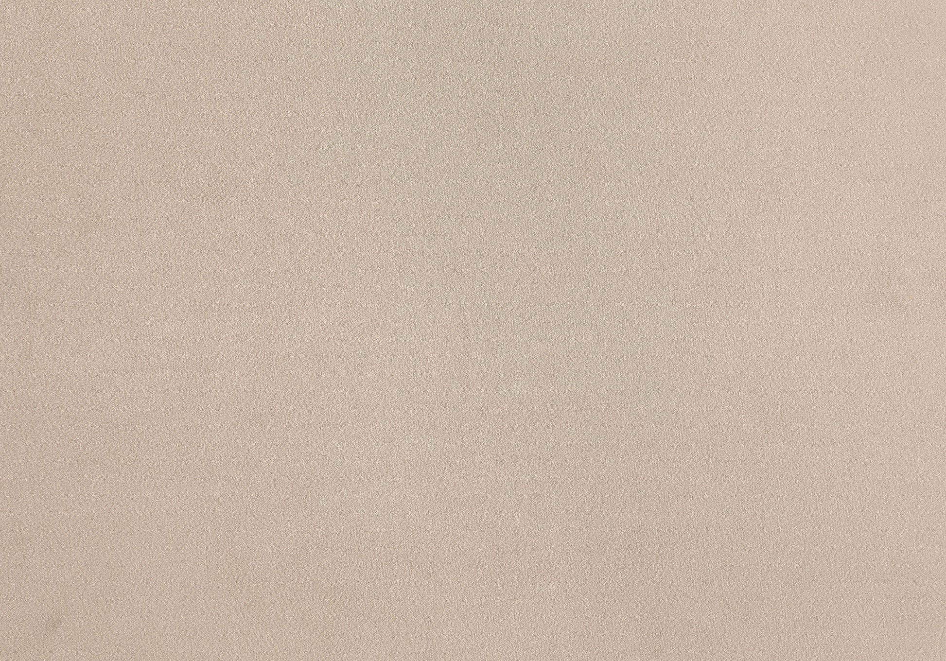 Closeup of a textured beige fabric swatch ideal for upholstery