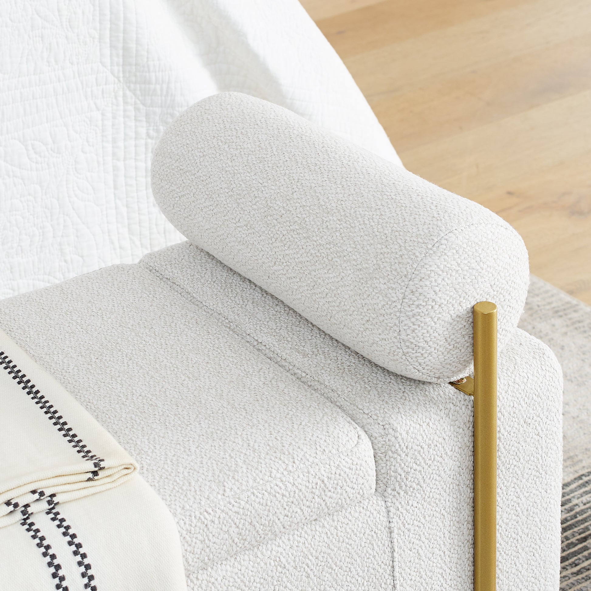 Textured boucle accent chair in light gray with gold metal legs