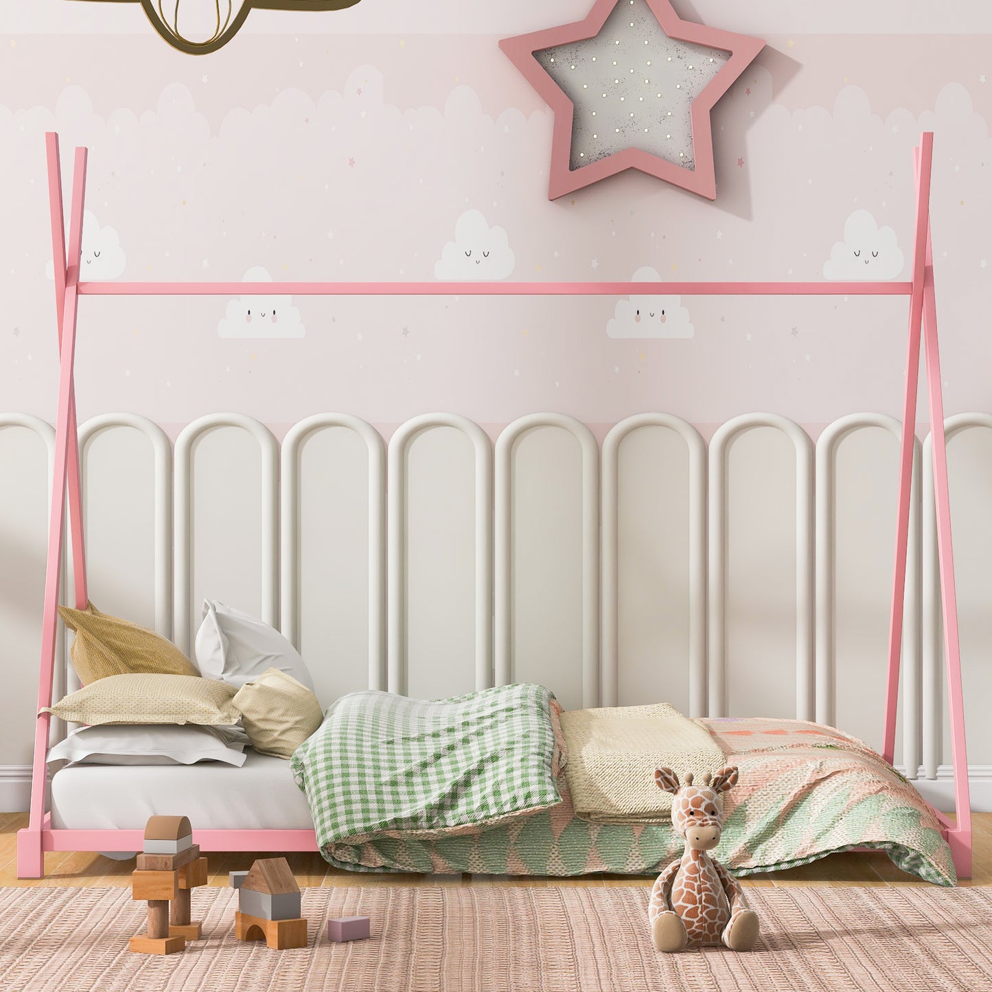 Pink canopy bed frame with assorted pillows and blankets