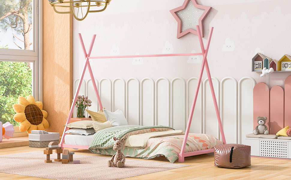 Pink teepee bed frame with pastel bedding and stuffed animals