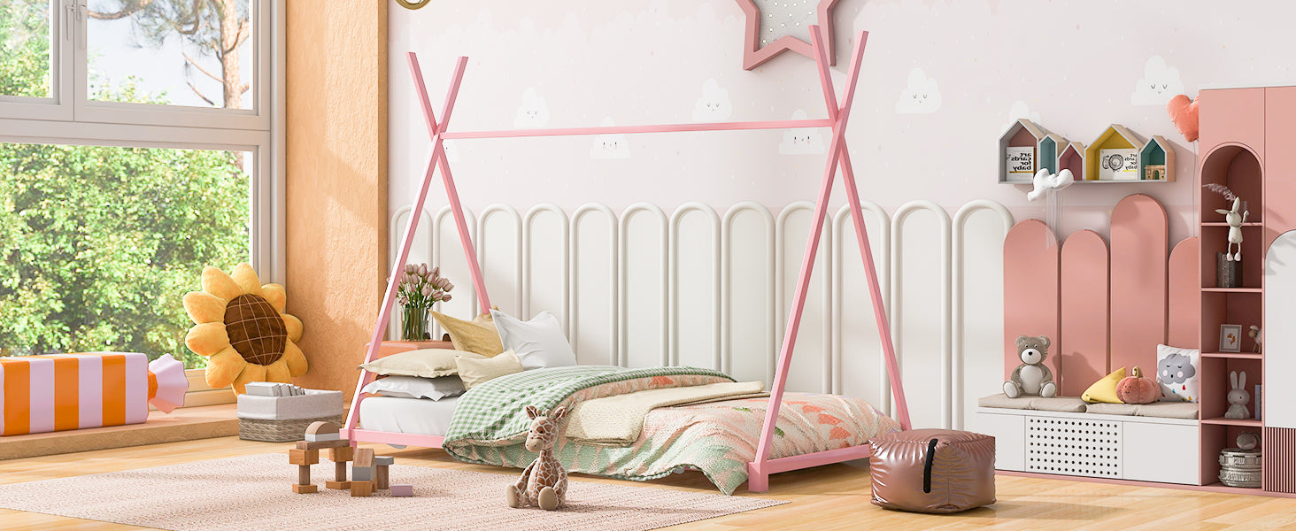 Pink teepee bed frame with patterned bedding and stuffed animals