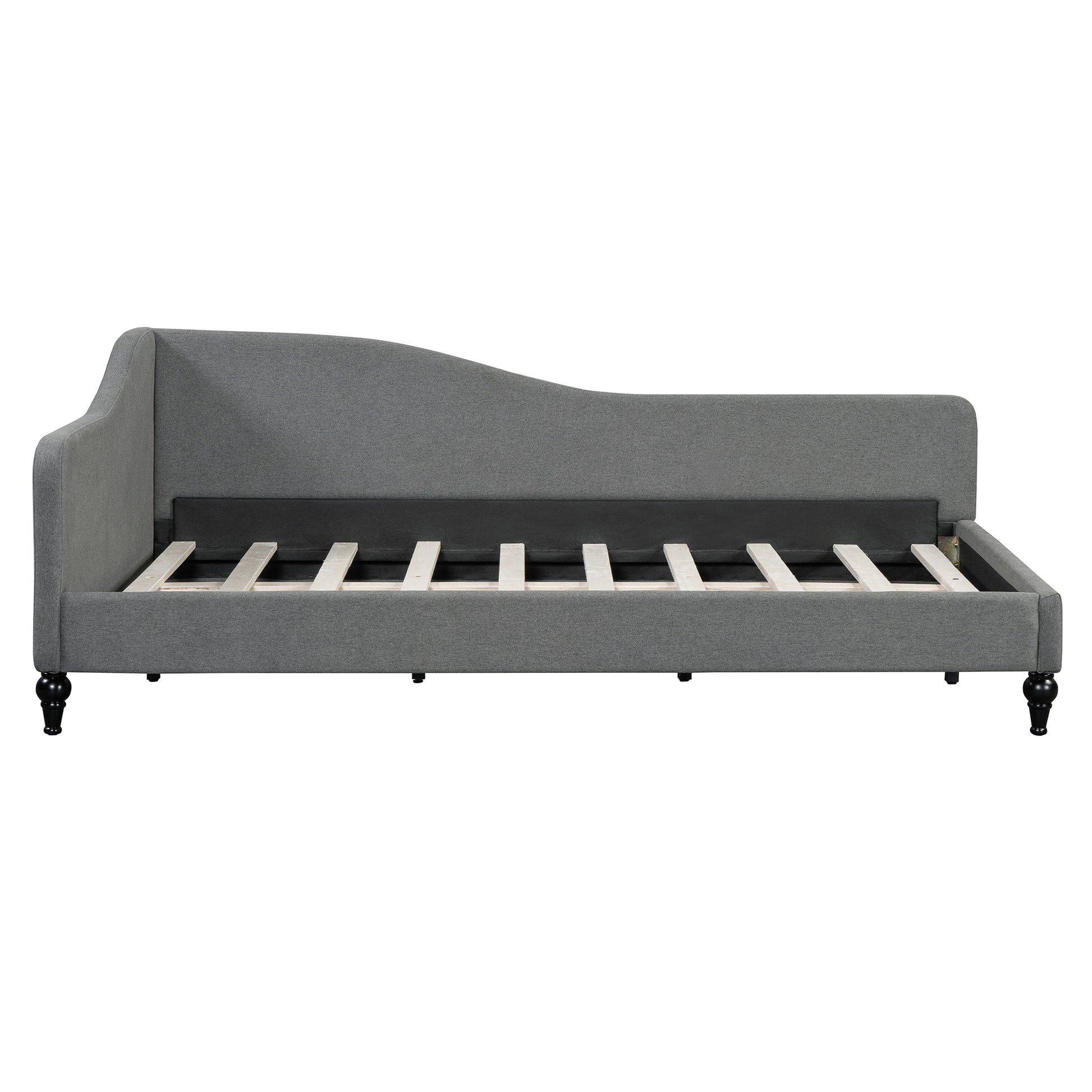 Grey fabric daybed with a curved armrest and wooden slats