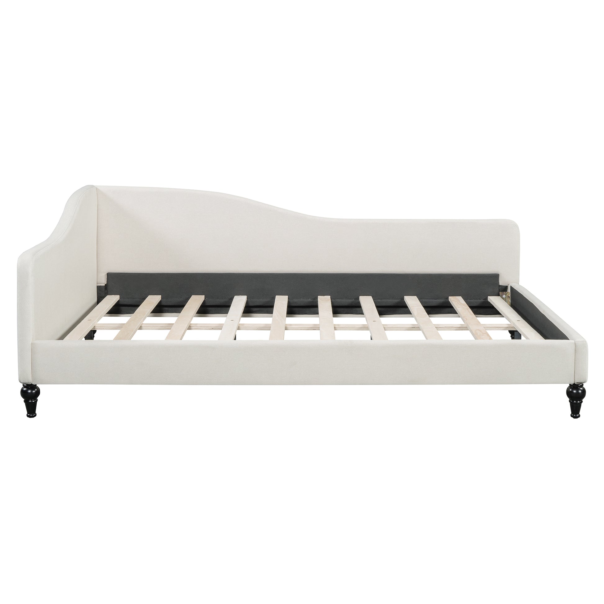 Cream upholstered daybed with curved back and wooden slats