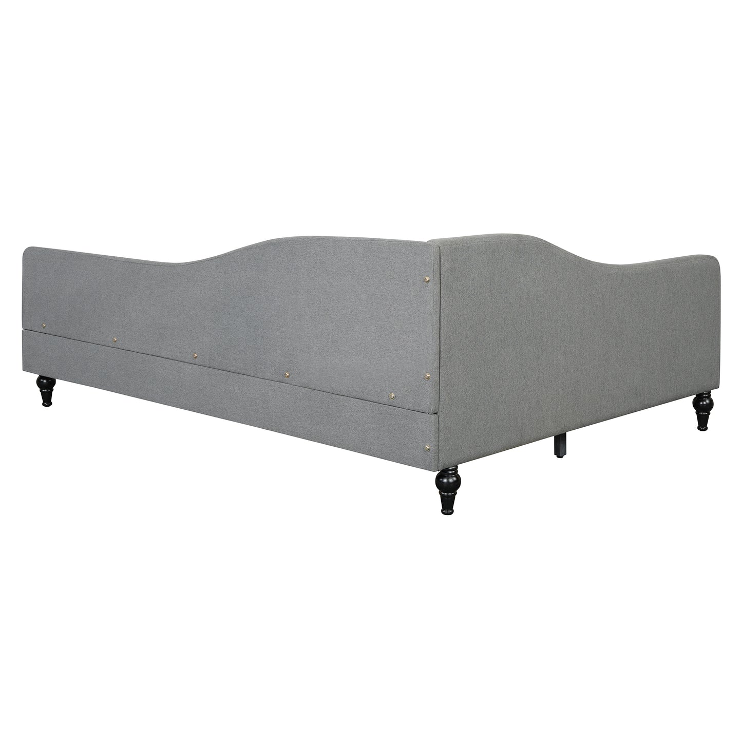 Gray upholstered daybed with curved back and ornate black legs