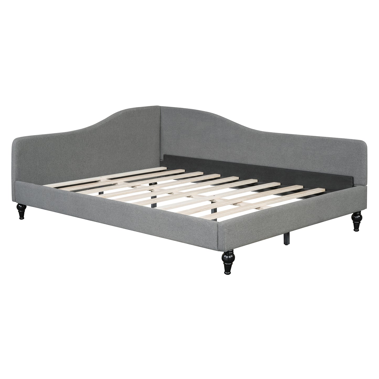 Grey upholstered daybed with ornate legs and wooden slat support