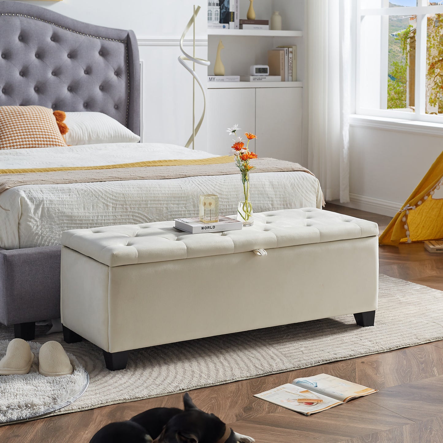 Tufted cream velvet storage ottoman with dark wood legs