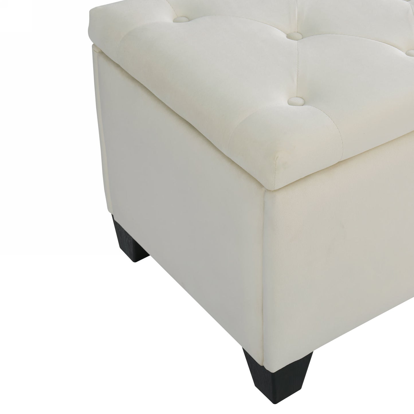 Cream velvet storage ottoman with tufted lid and dark wood legs