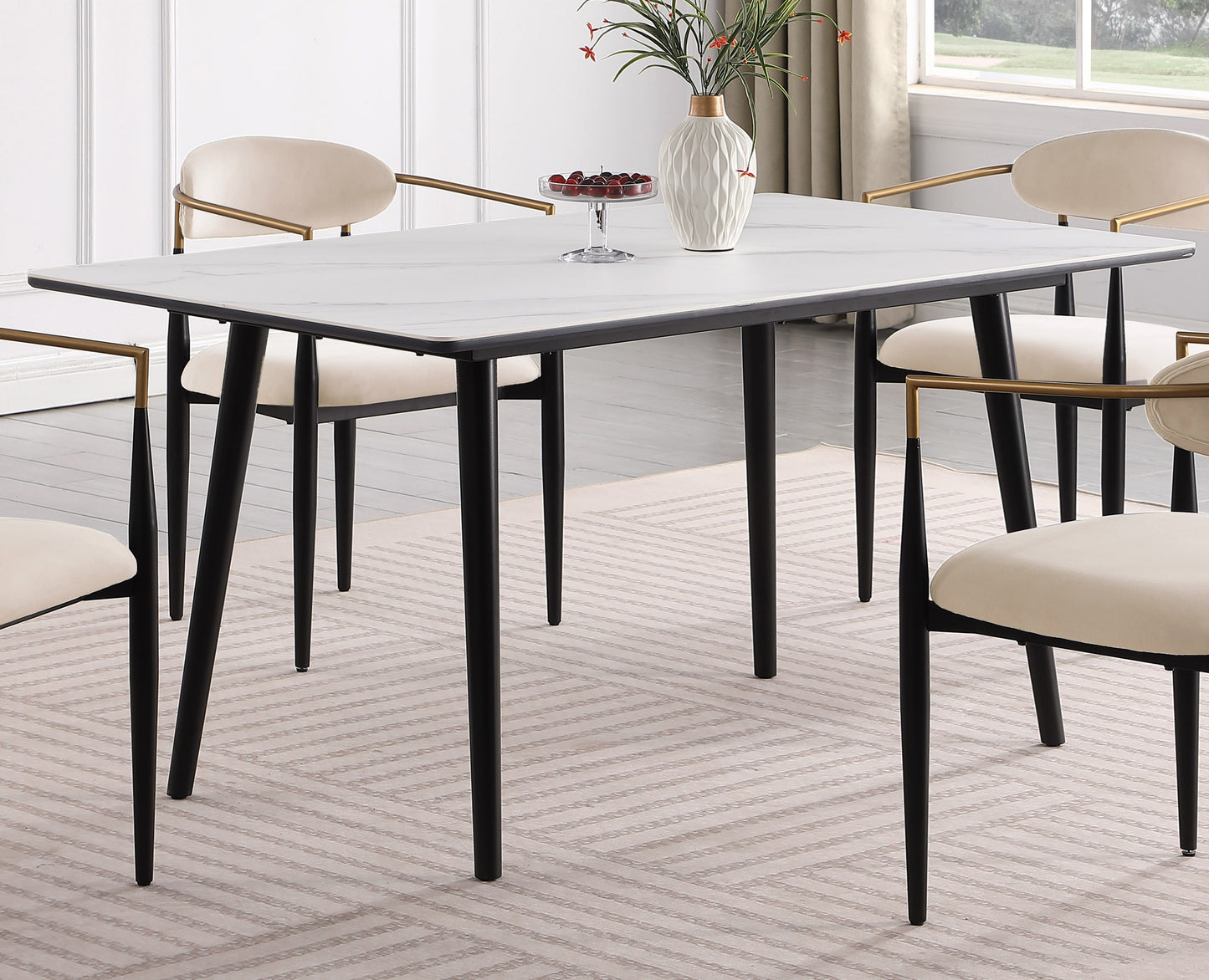 Modern dining table with white marble top and black legs set for four