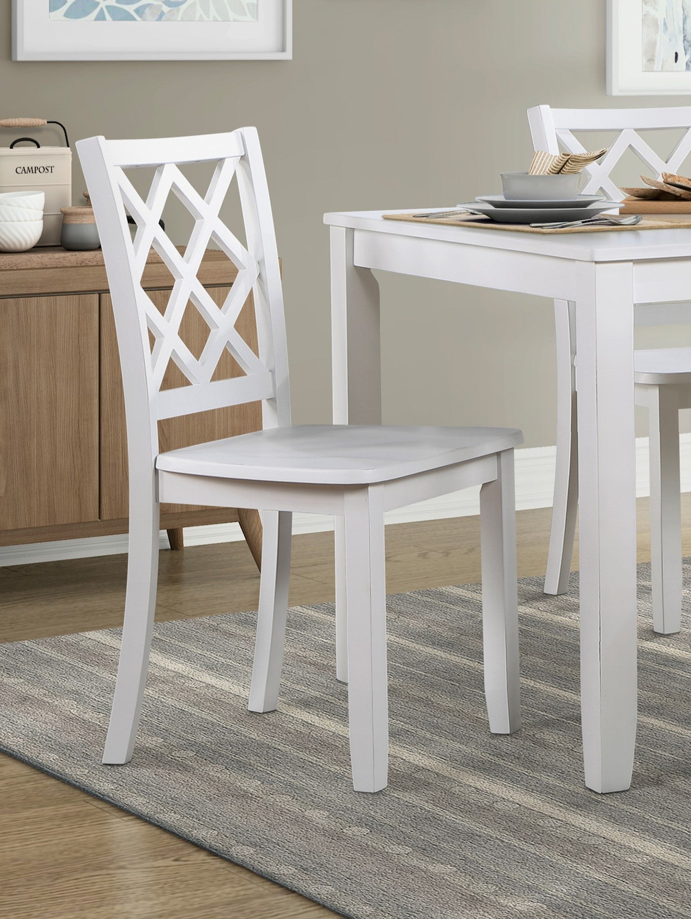 White wooden dining chair with a lattice back design perfect for a modern kitchen