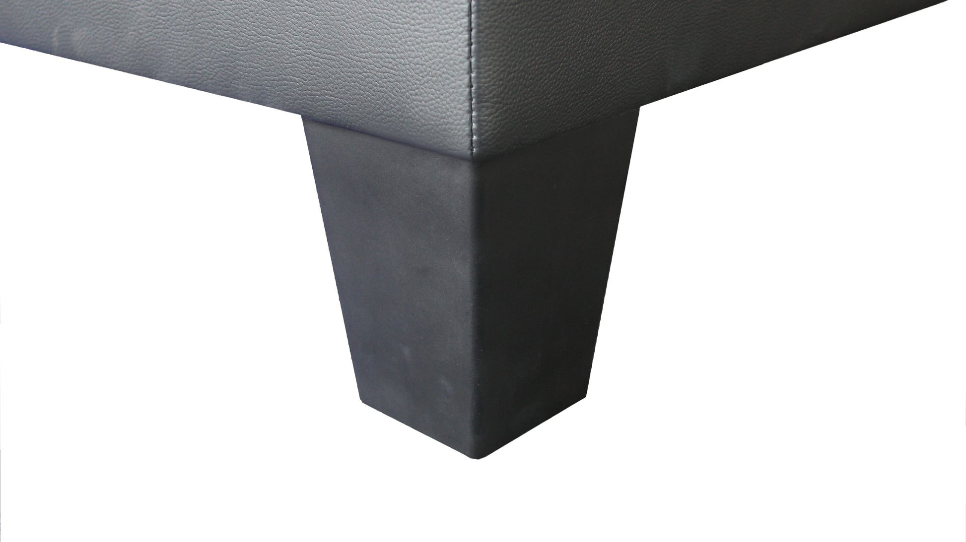 Dark grey faux leather sectional sofa corner with a modern black leg