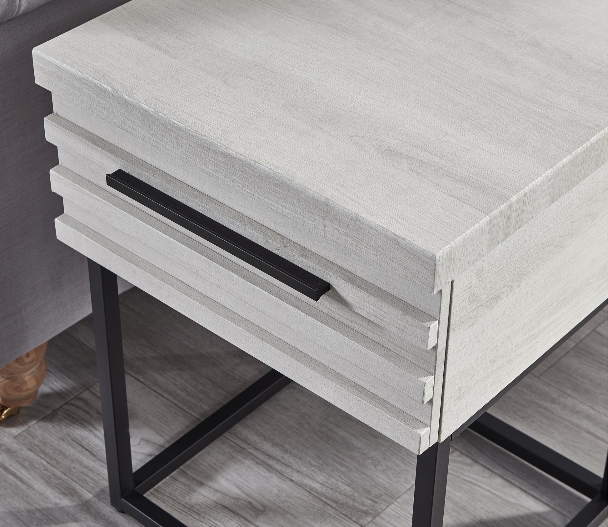 Modern white wood end table with black drawer pull and metal legs