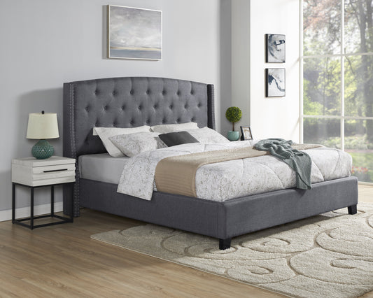 Tufted charcoal grey fabric bed with silver nailhead trim
