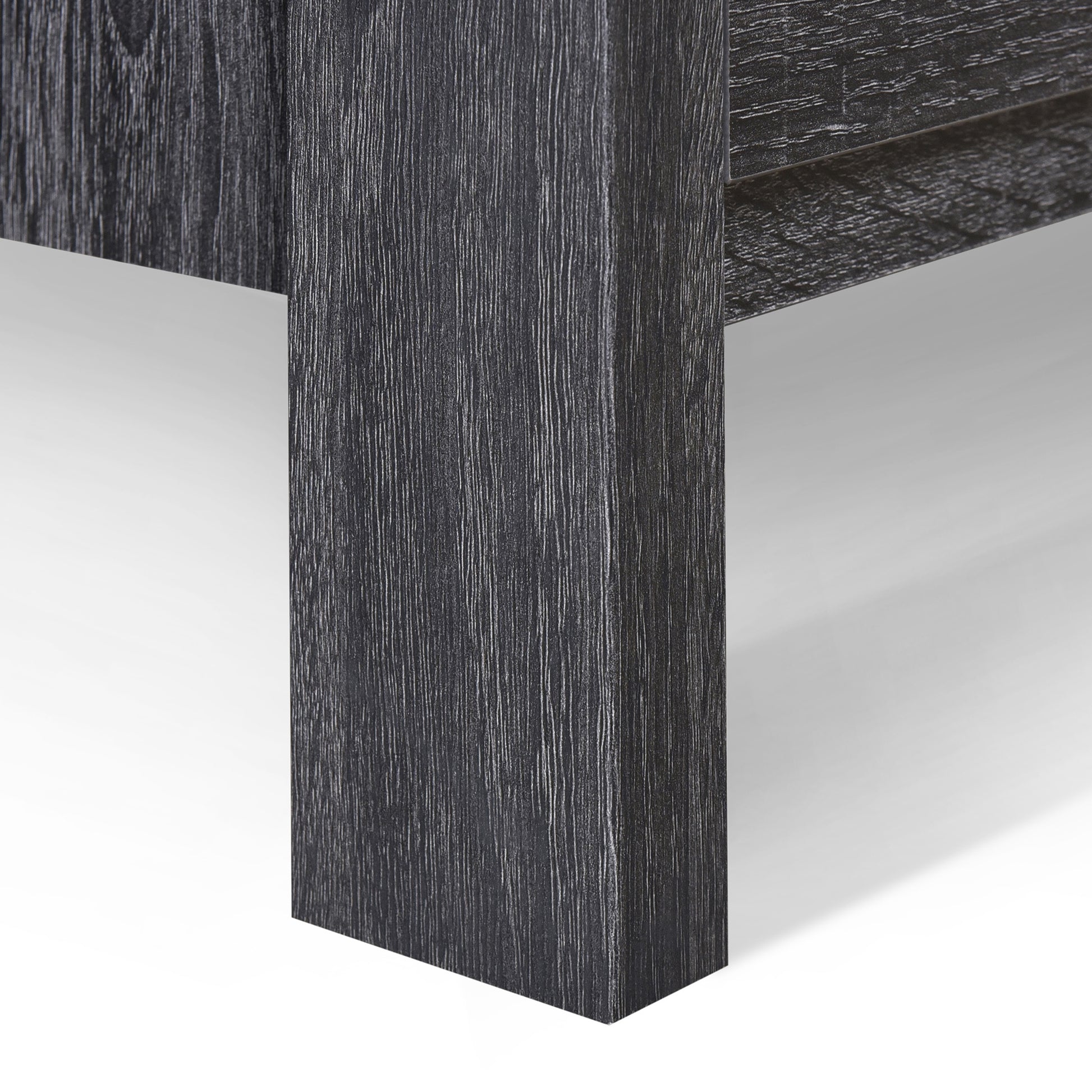 Dark gray wood grain texture on a rectangular furniture leg