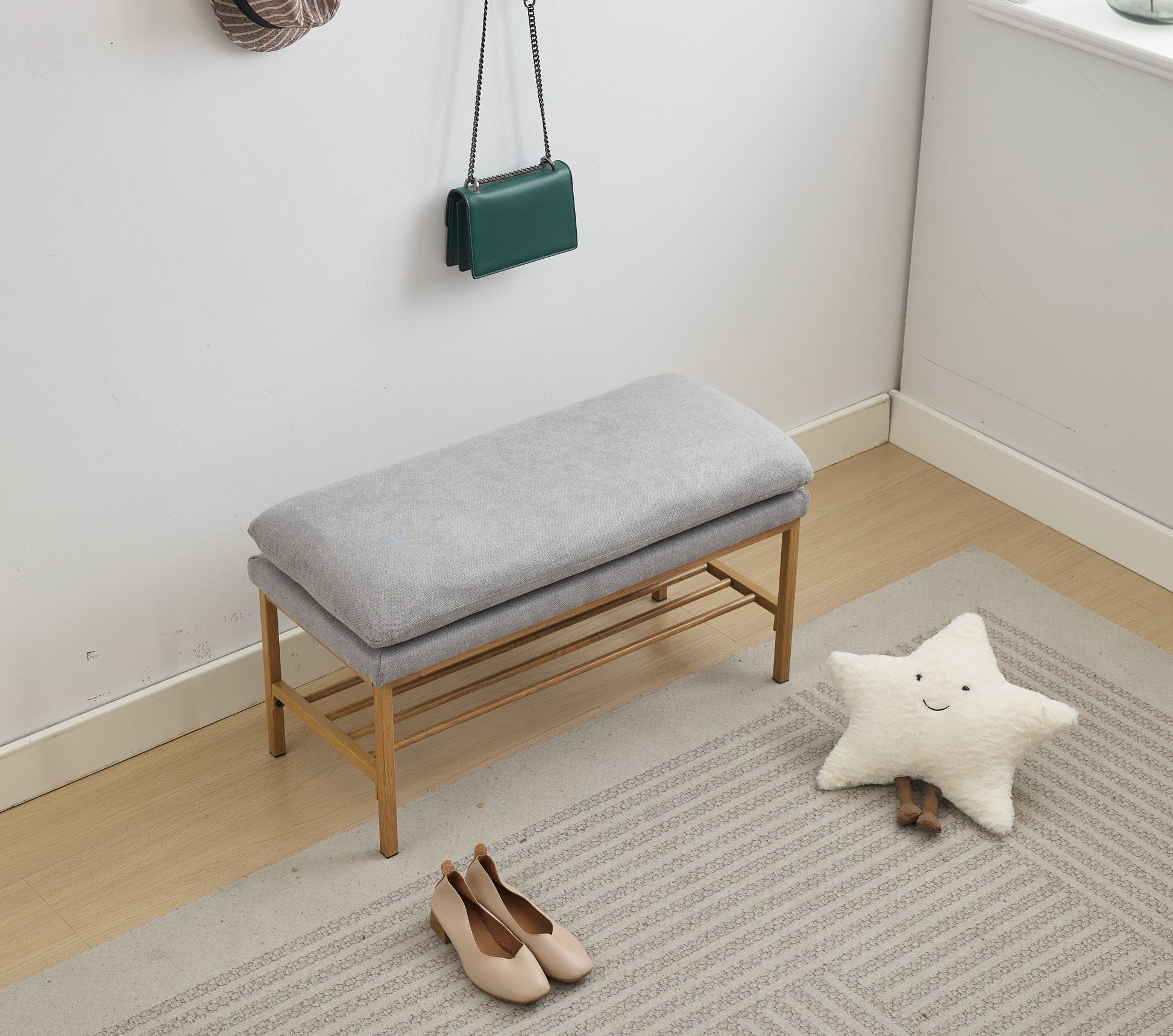 Gray fabric entryway bench with wood frame and shoe rack