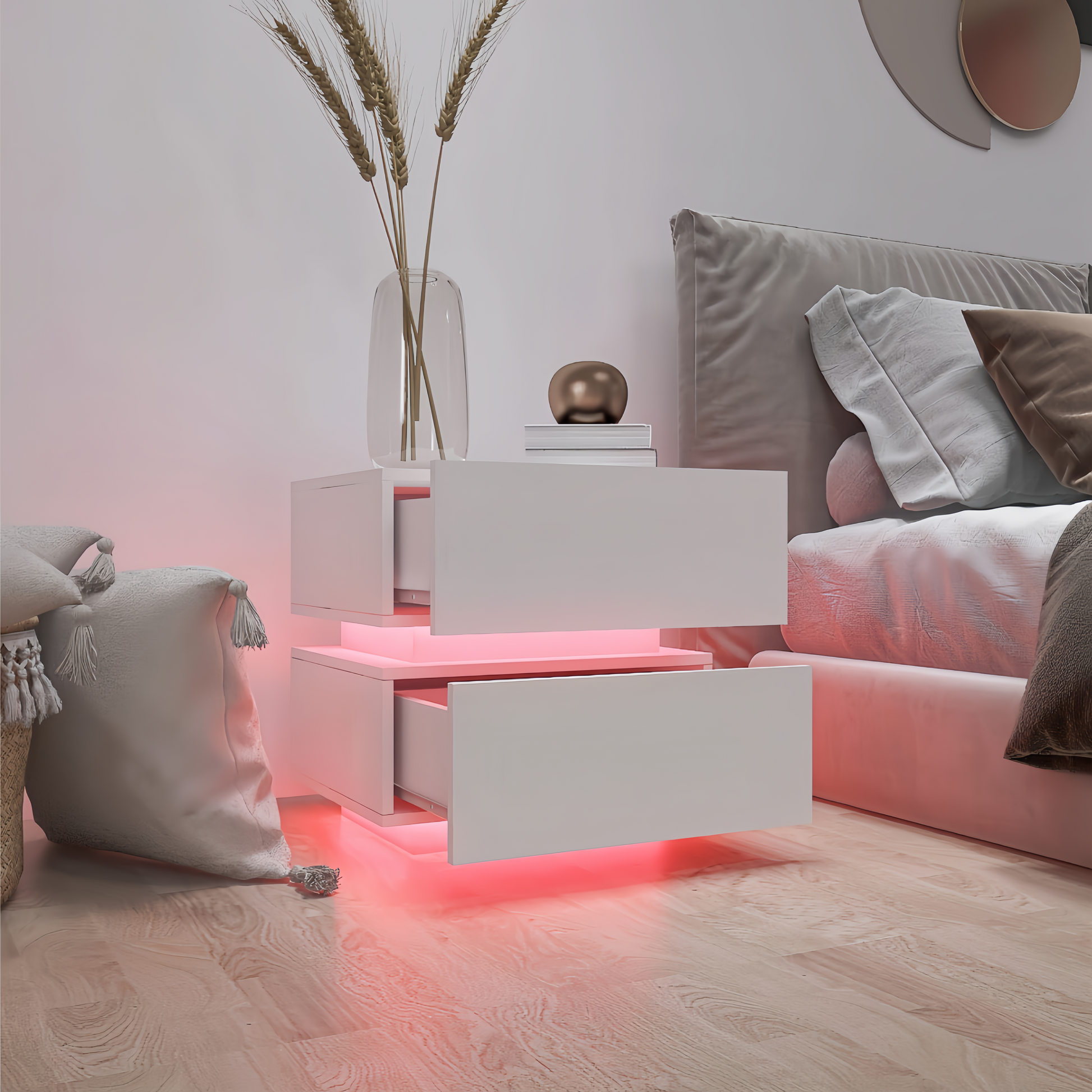 White floating nightstand with two drawers illuminated by pink LED lights