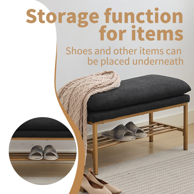 Dark gray upholstered bench with slatted wood shoe rack